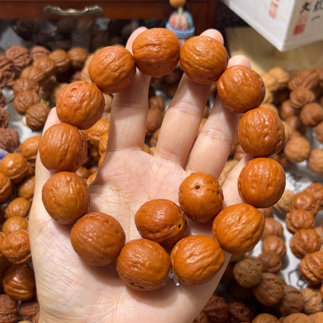 阿***双桃核吊坠橘皮光头