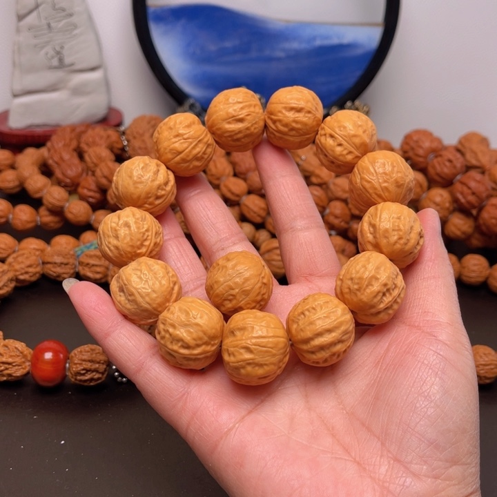 文玩核桃吊坠飘***动核桃手串