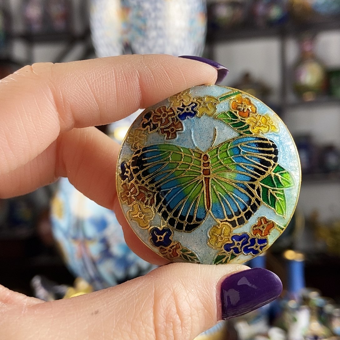 熙***、铜白色烧银蓝蝴蝶大吊坠