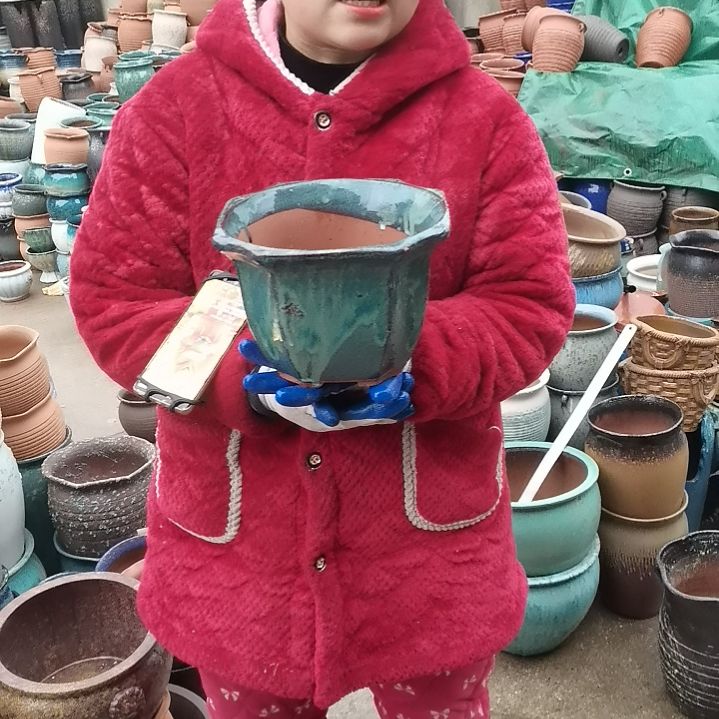 红陶口21高15瑕疵一个