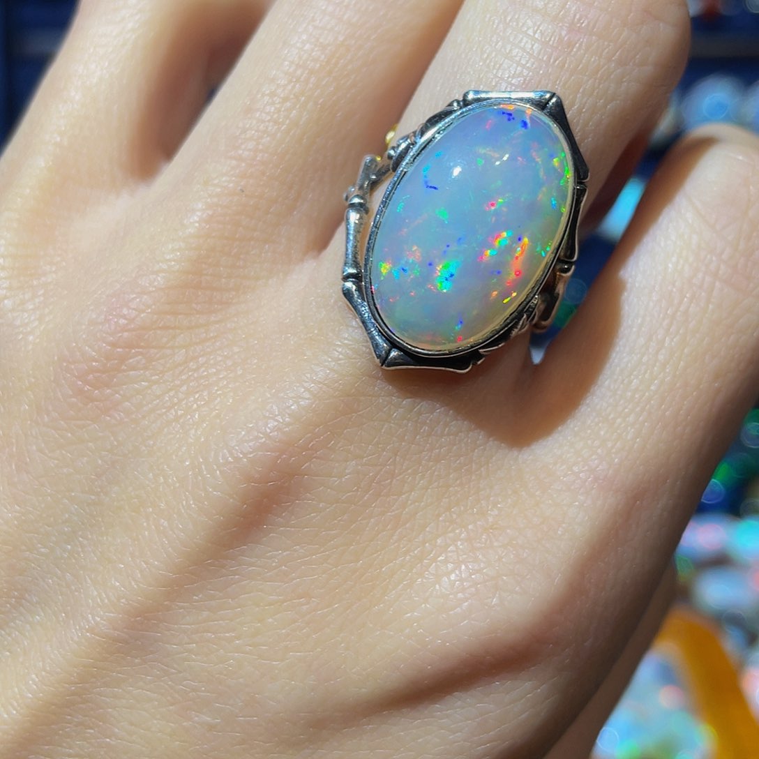 欧泊欧泊戒指银S925镶嵌那****.