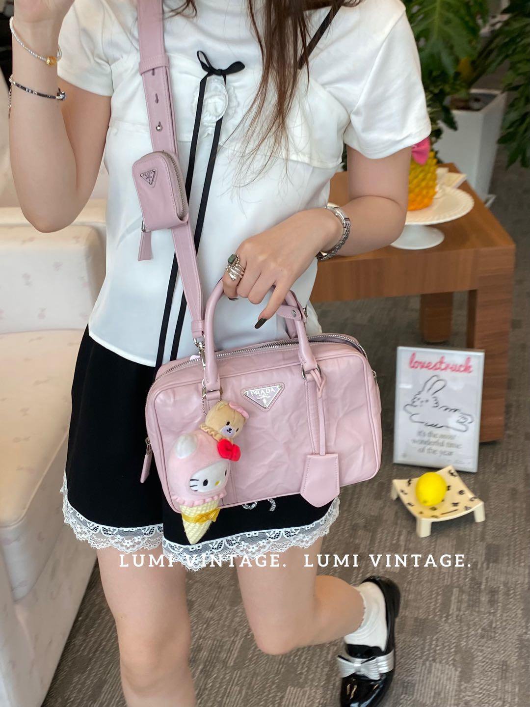 95新 Prada/普拉达 粉色油蜡羊皮斜挎公文斜挎包 36030010