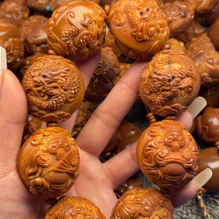 橄榄核吊坠黄**月橄榄核