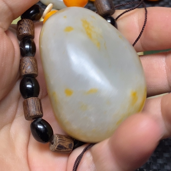 和田玉未镶嵌挂件紫**记