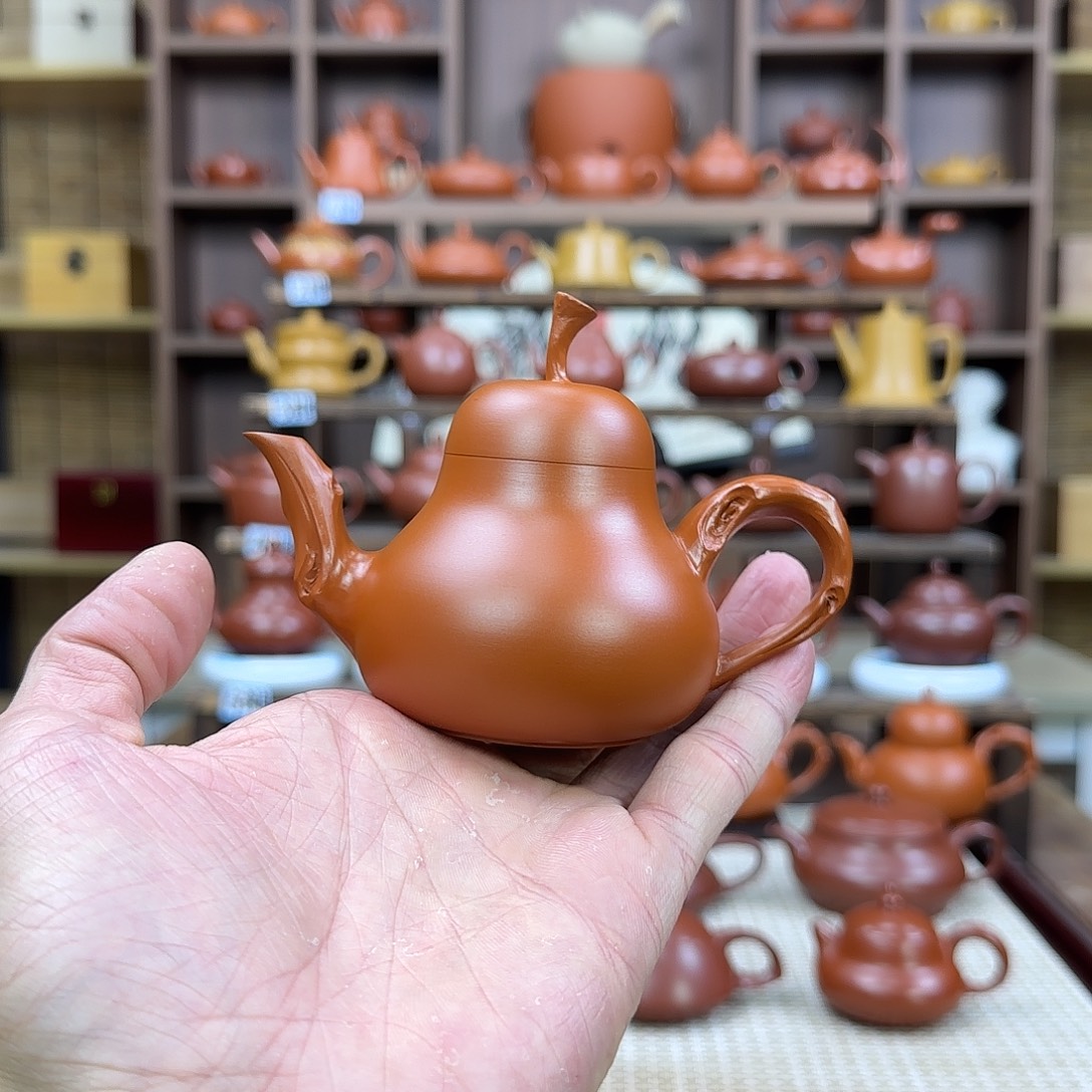 紫砂茶壶潮州手拉壶朱泥花梨