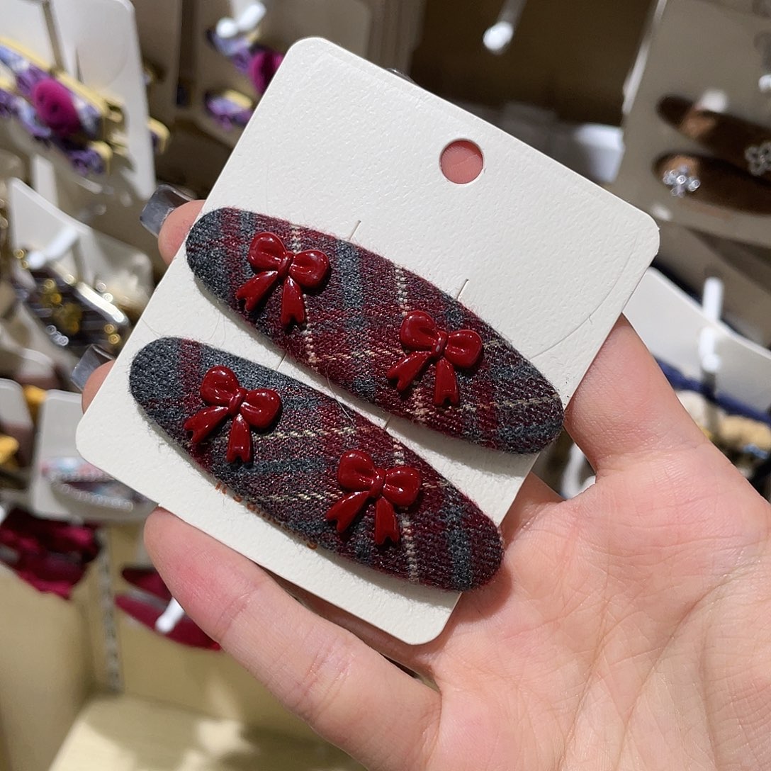 柠***糕硅胶非金属椭圆红格蝴蝶结