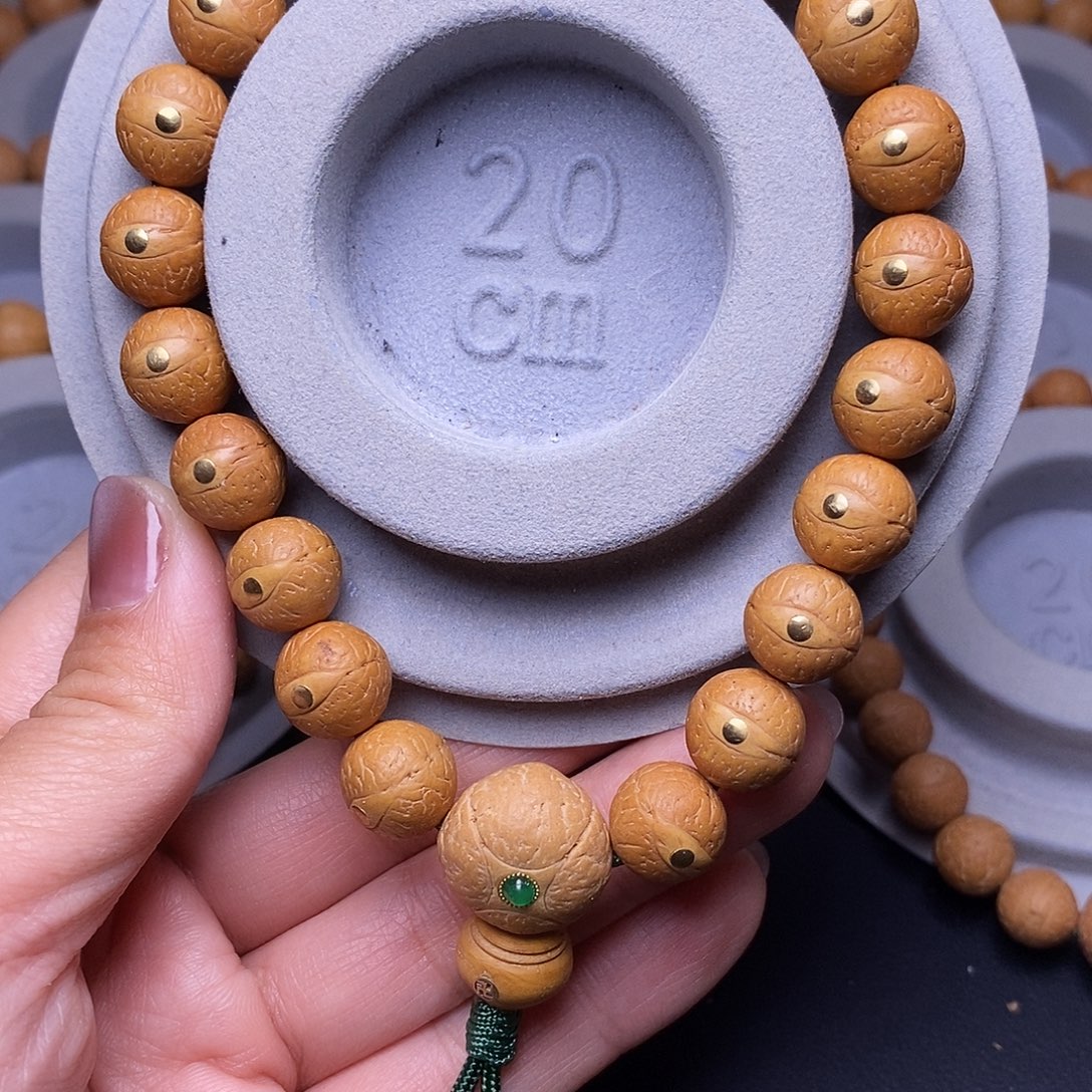 凤眼菩提吊坠铜手串