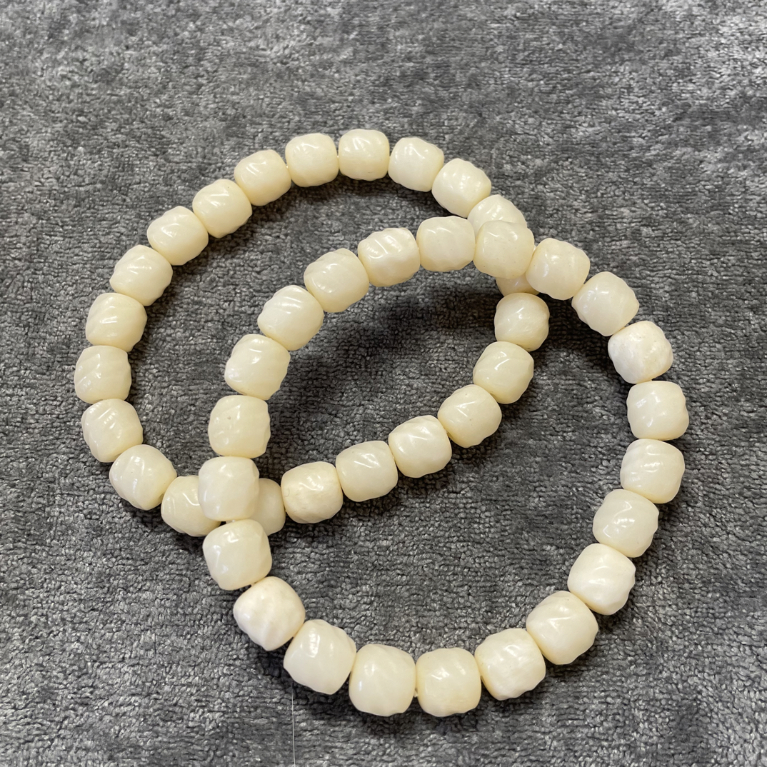 驼骨吞噬桶珠手串