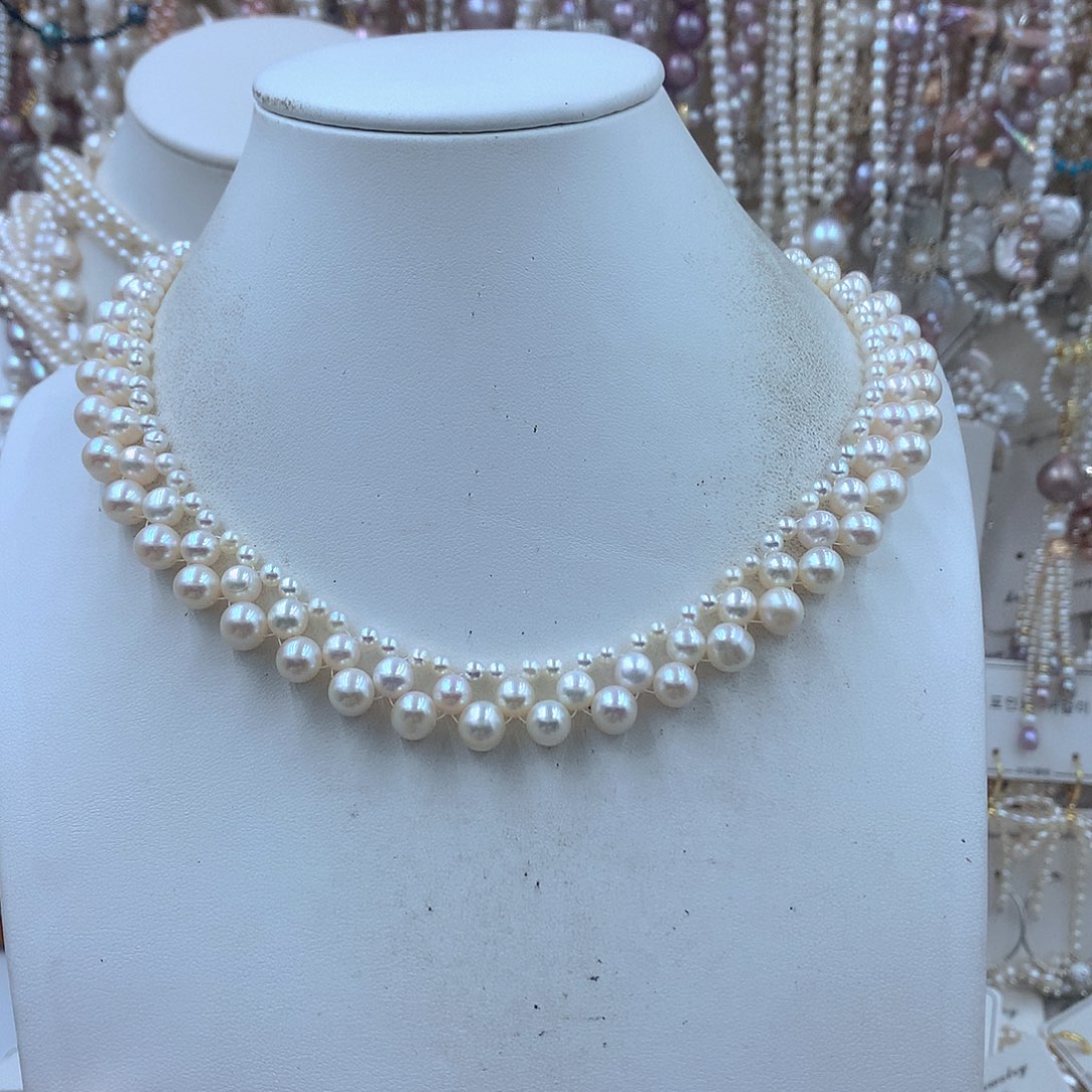 小***姐淡水珍珠银S925镶嵌耳饰