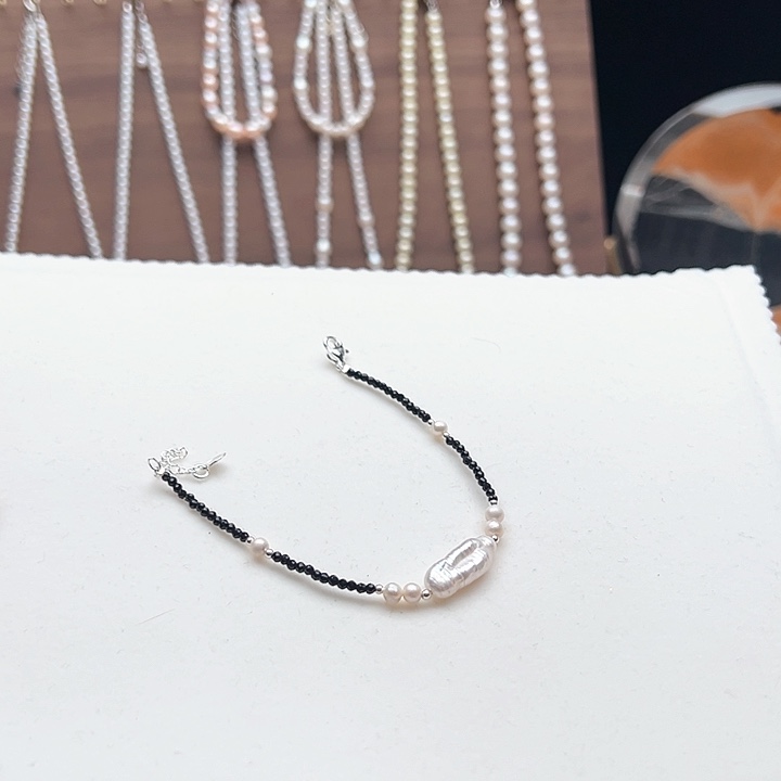 手绳淡水珍珠钛钢