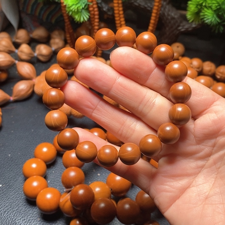 橄榄核手串张*友1.2红料光珠