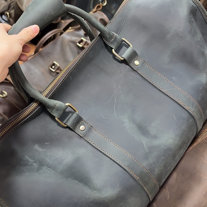 小牛皮（革）头层牛皮墨绿旅行包