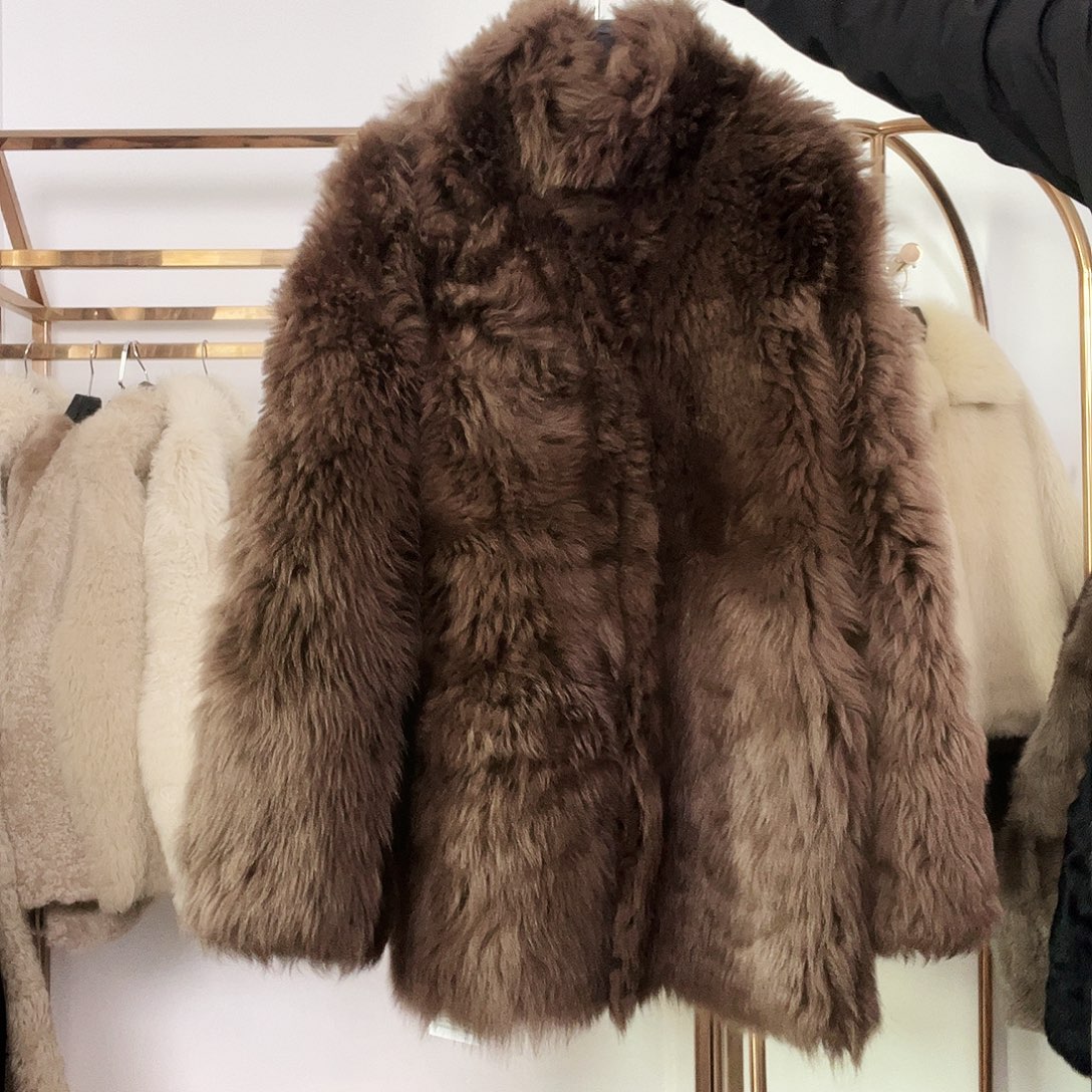 彭***_棕色卷毛托斯卡纳中长L码