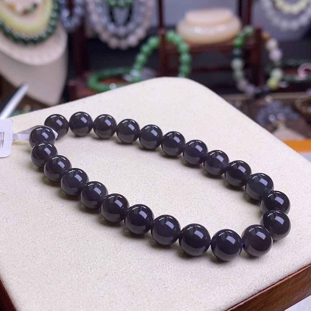 和田玉收藏级烟紫帝王紫高冰圆珠手串8m未镶嵌