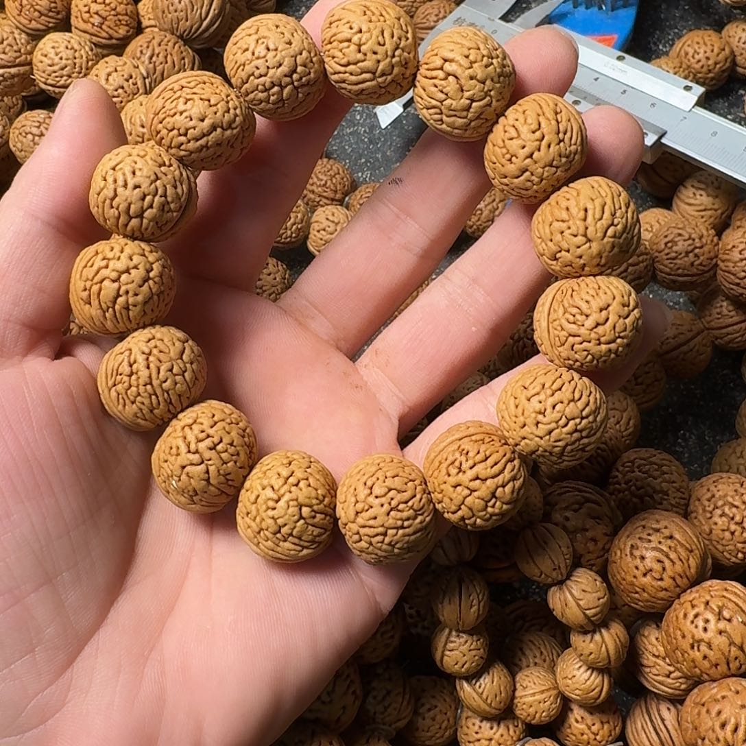 魁***L吊坠桃核野生肌肉手串