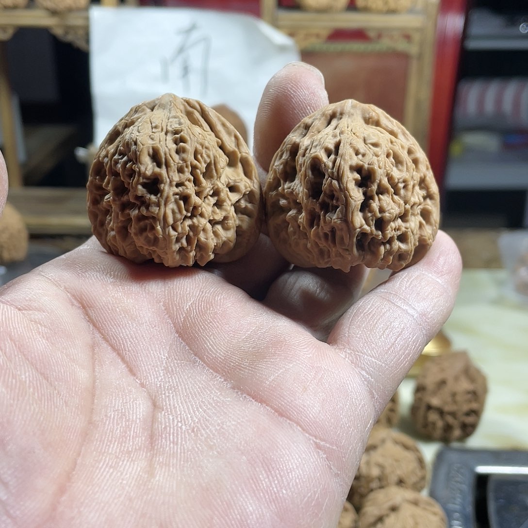 桃核吊坠保**末文玩核桃南将石