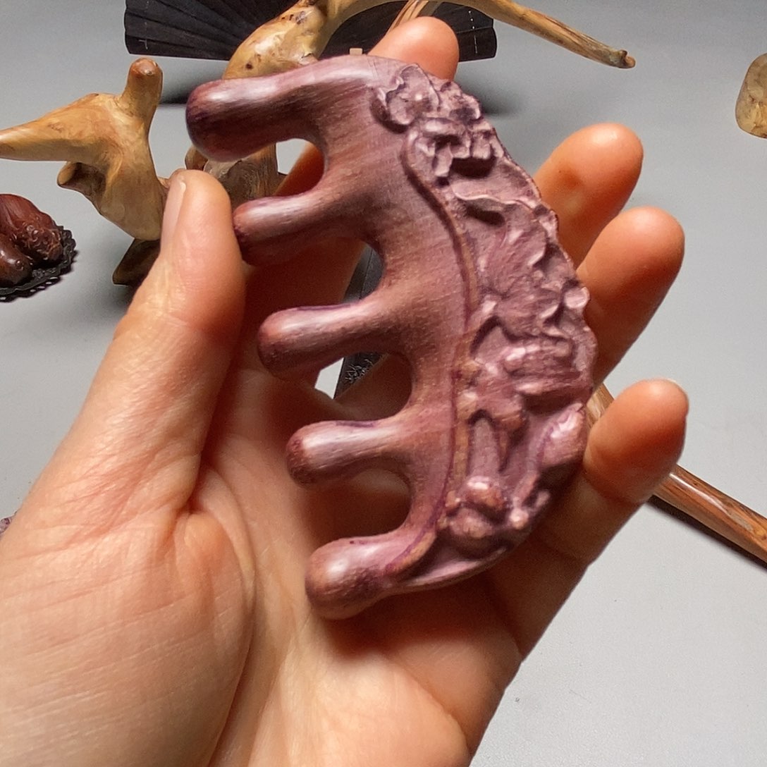 楠木旭****小紫罗兰按摩梳