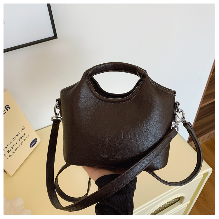 小众手提菜篮子包包女2025秋冬潮新款时尚高级感水桶包单肩斜跨包