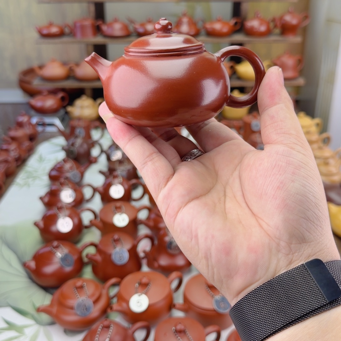 鲨***鱼紫砂茶壶朱泥大红袍寒江壶