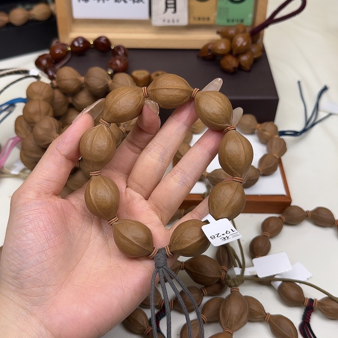 弄***来手串/手链橄榄核三花19.28