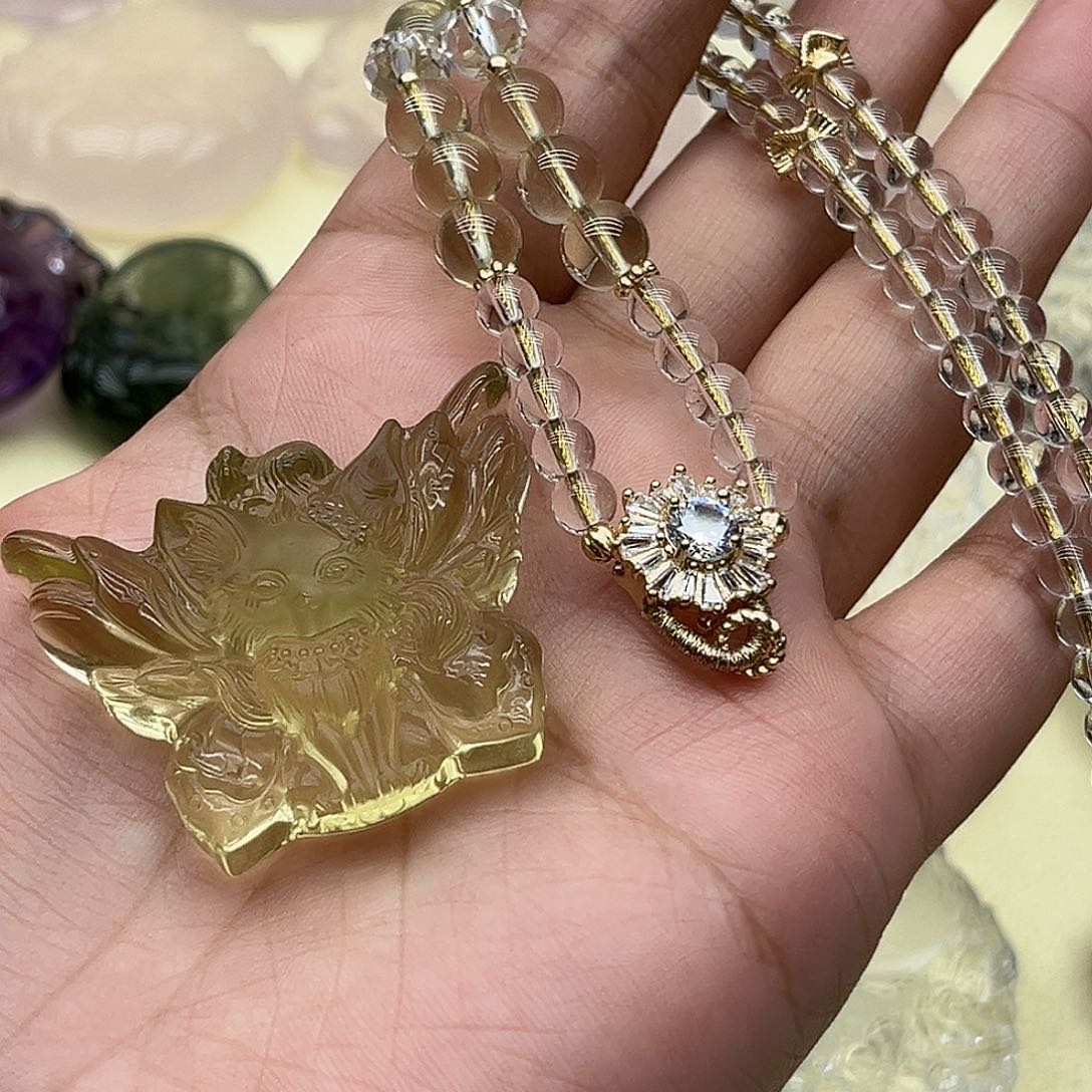 紫***几颈饰合金水晶黄水蝴蝶