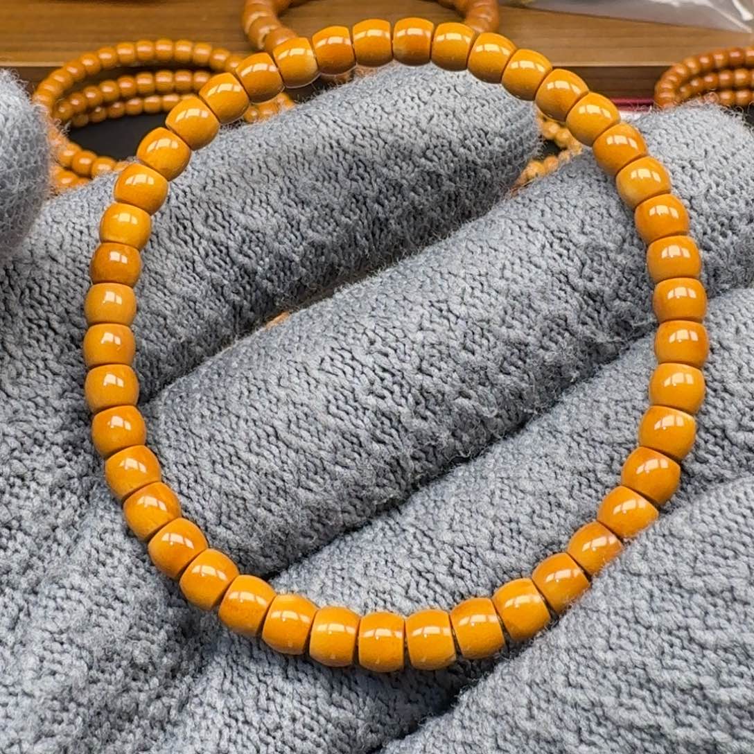 五***哥橄榄核手串/手链571老挝核尖直切单圈微白