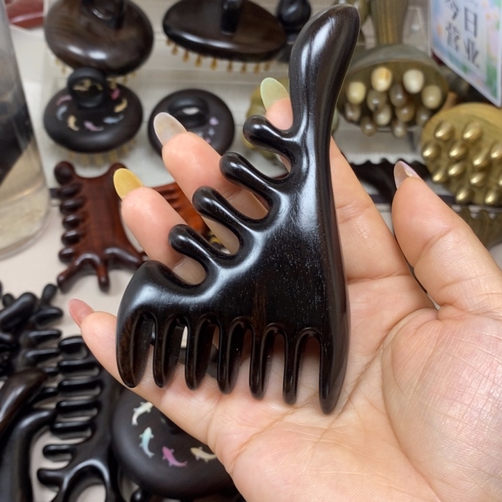 紫光檀大拇指按摩梳