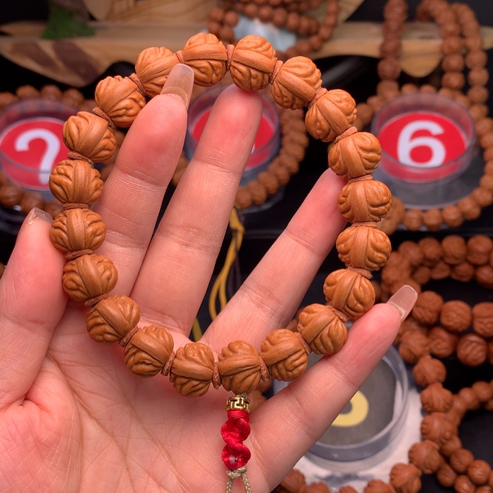 桃核吊坠1.5野生红莲手串