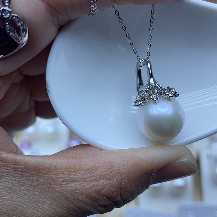 凡***晨颈饰淡水珍珠银S925镶嵌