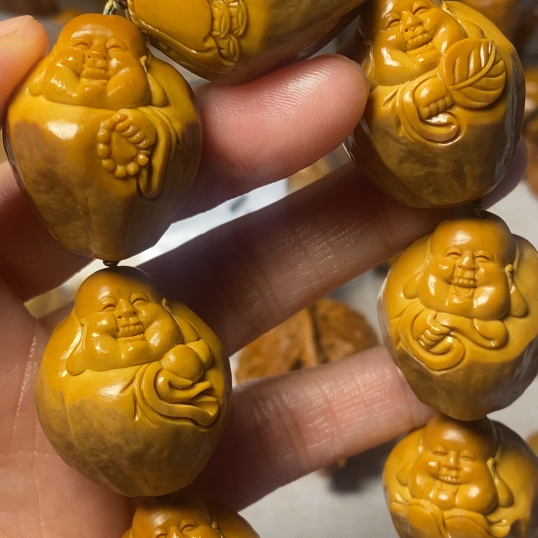 橄榄核手串/手链行**里包衣弥勒