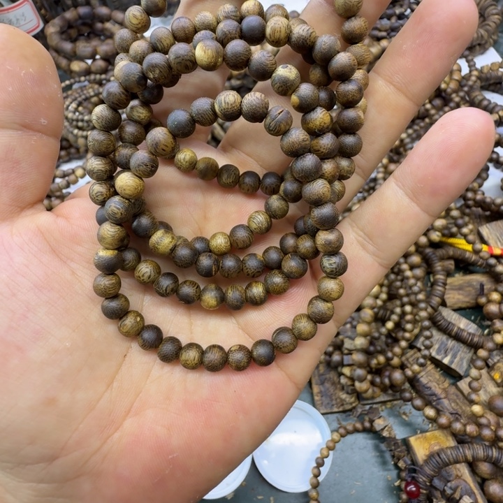 沉香沉香碎屑奇楠沉香乌身卡0.6单圈虫漏珠3克+