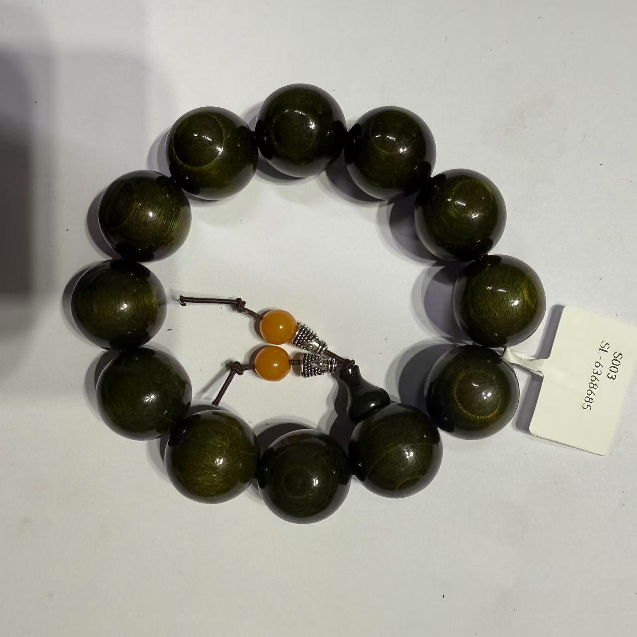 S003-金丝楠水波纹手串-无礼盒