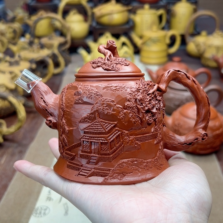 紫砂茶壶街**衣朱泥山水紫砂壶