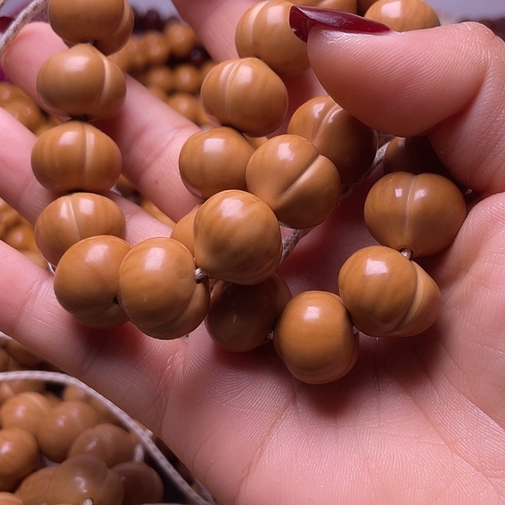 梓***荞猴头核桃手串17尺寸镜面柯基屁桃手持全品无暇