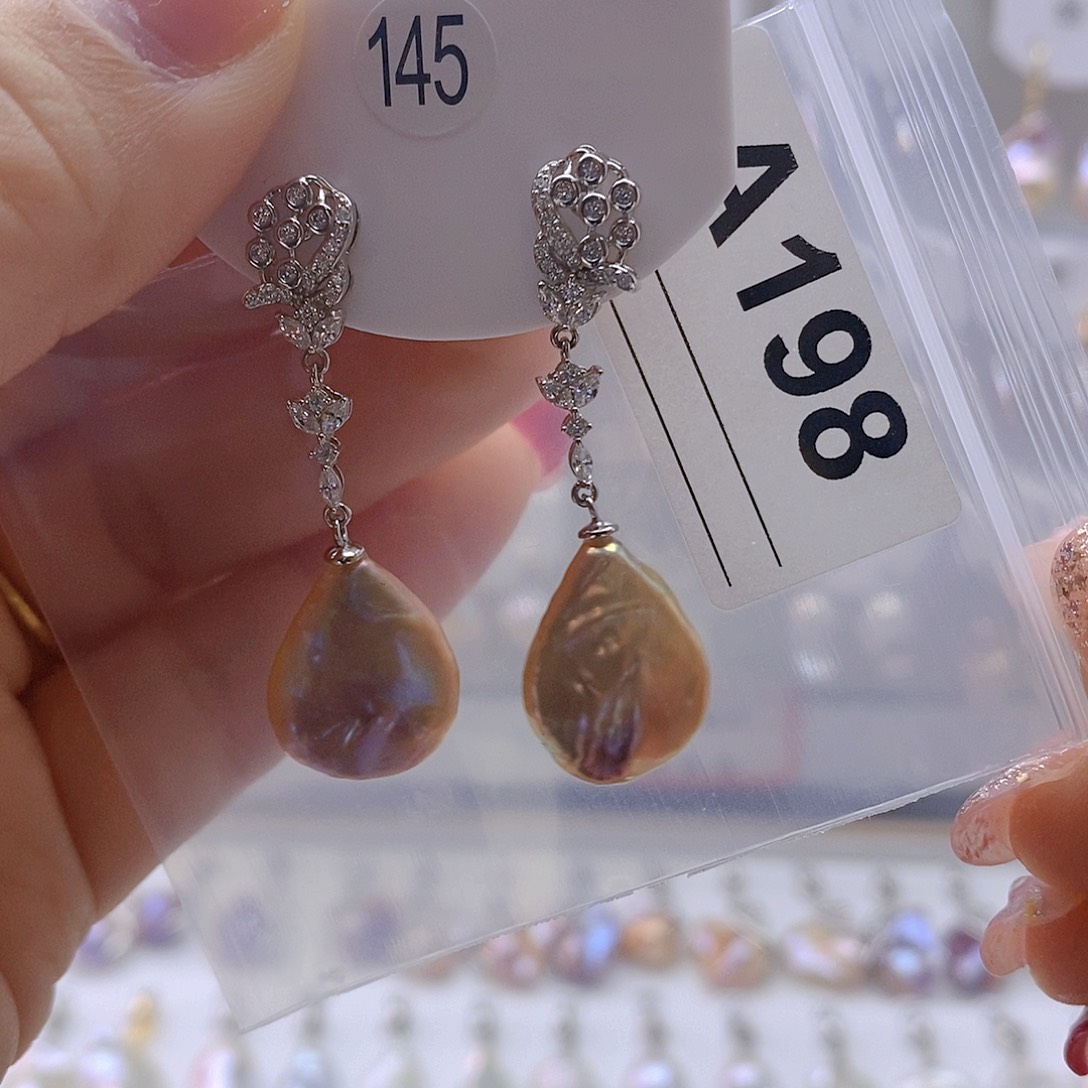 淡水珍珠耳饰银S925镶嵌奔****妙