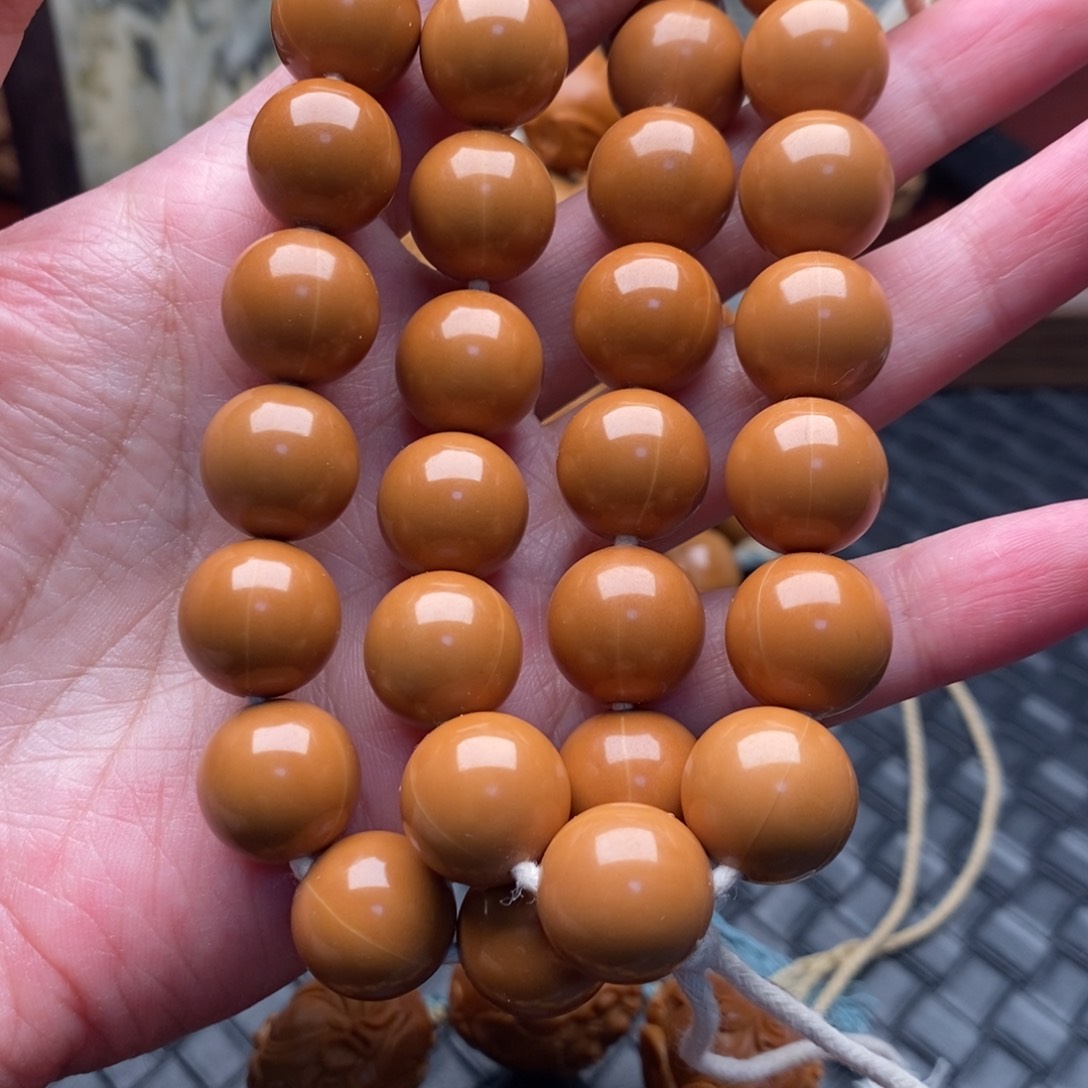 手串橄榄核猴头1.4光珠