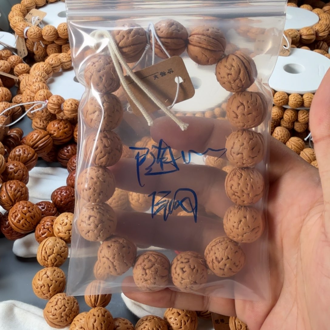 随***欲手串桃核盘锦肉丸子B