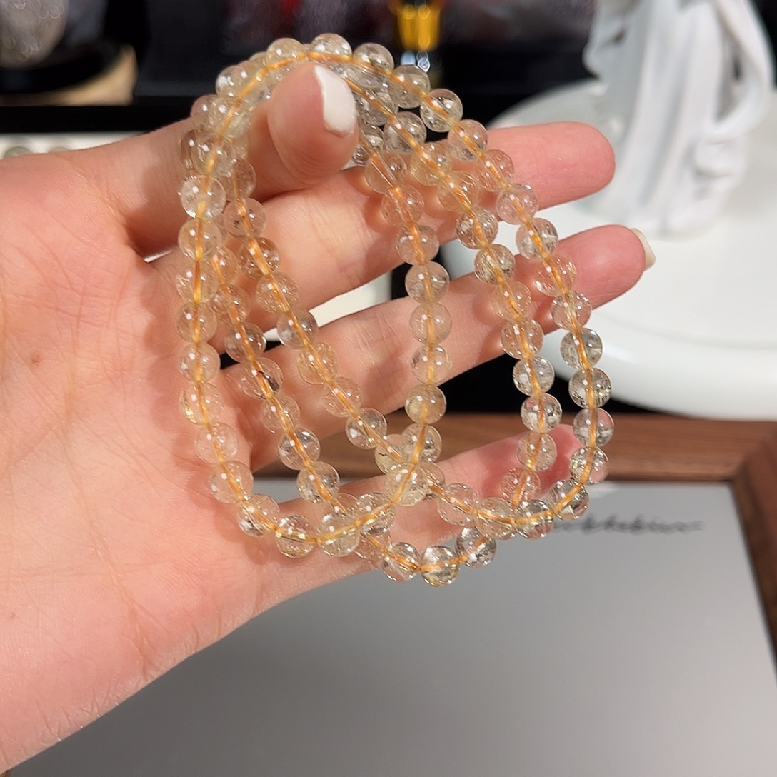 D***琪手链合金水晶金发晶手串三圈79元1