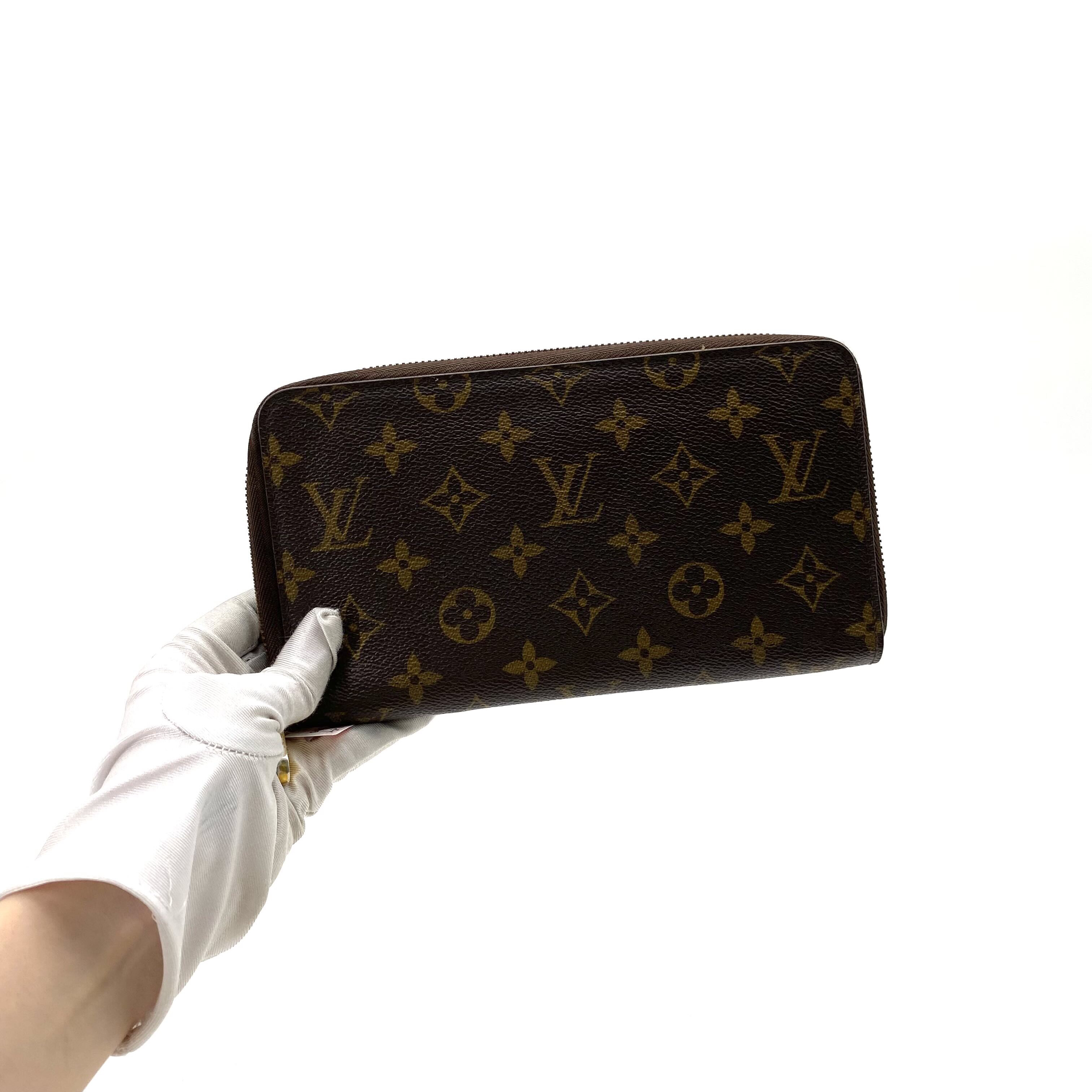 95新 LouisVuitton/路易威登 98棕老花zippy宽版拉链钱尺寸21/12