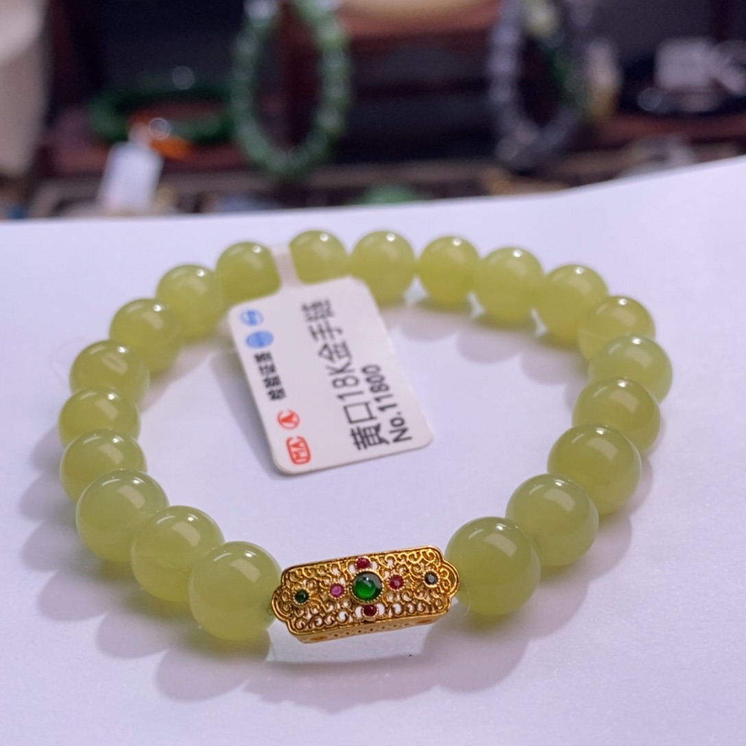 和田玉若羌金镶鸡油黄手串8MM未镶嵌