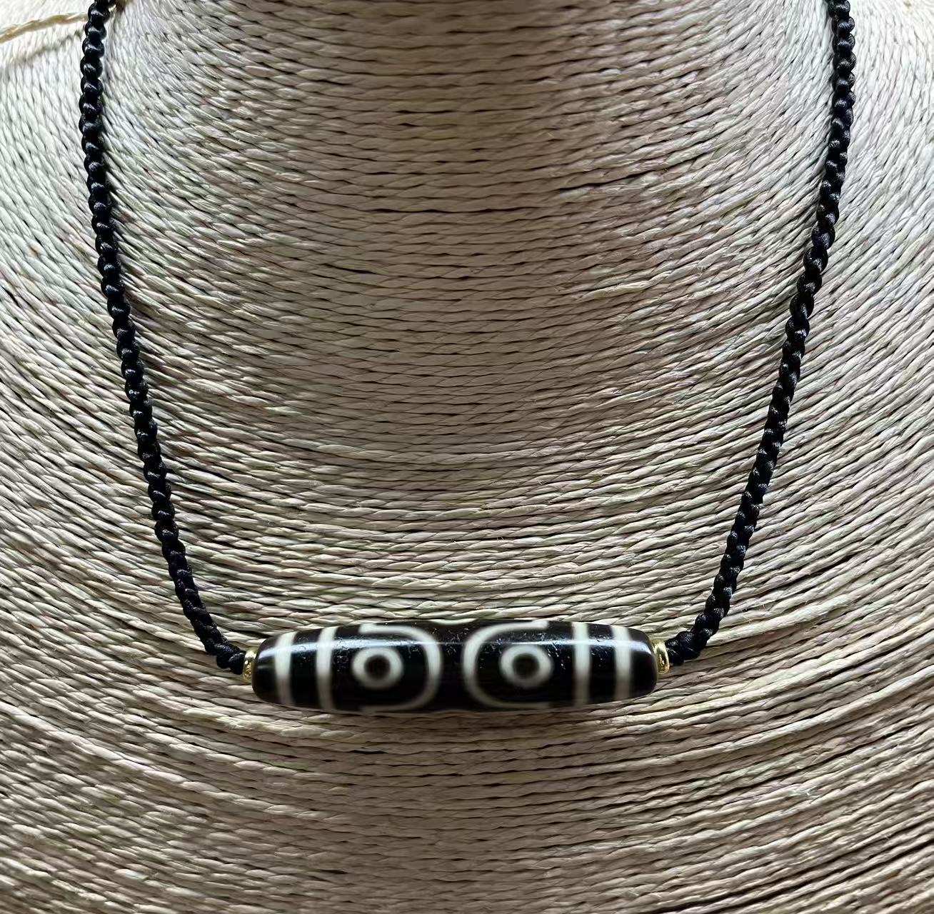 建成7A牙黄十字6眼锁骨链