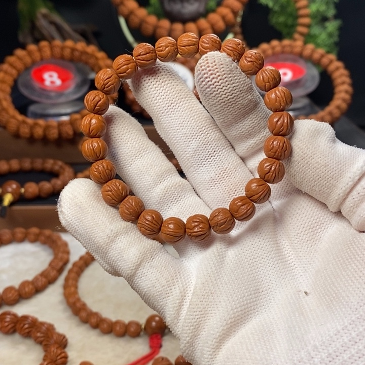 桃核吊坠一**人秦岭龙纹