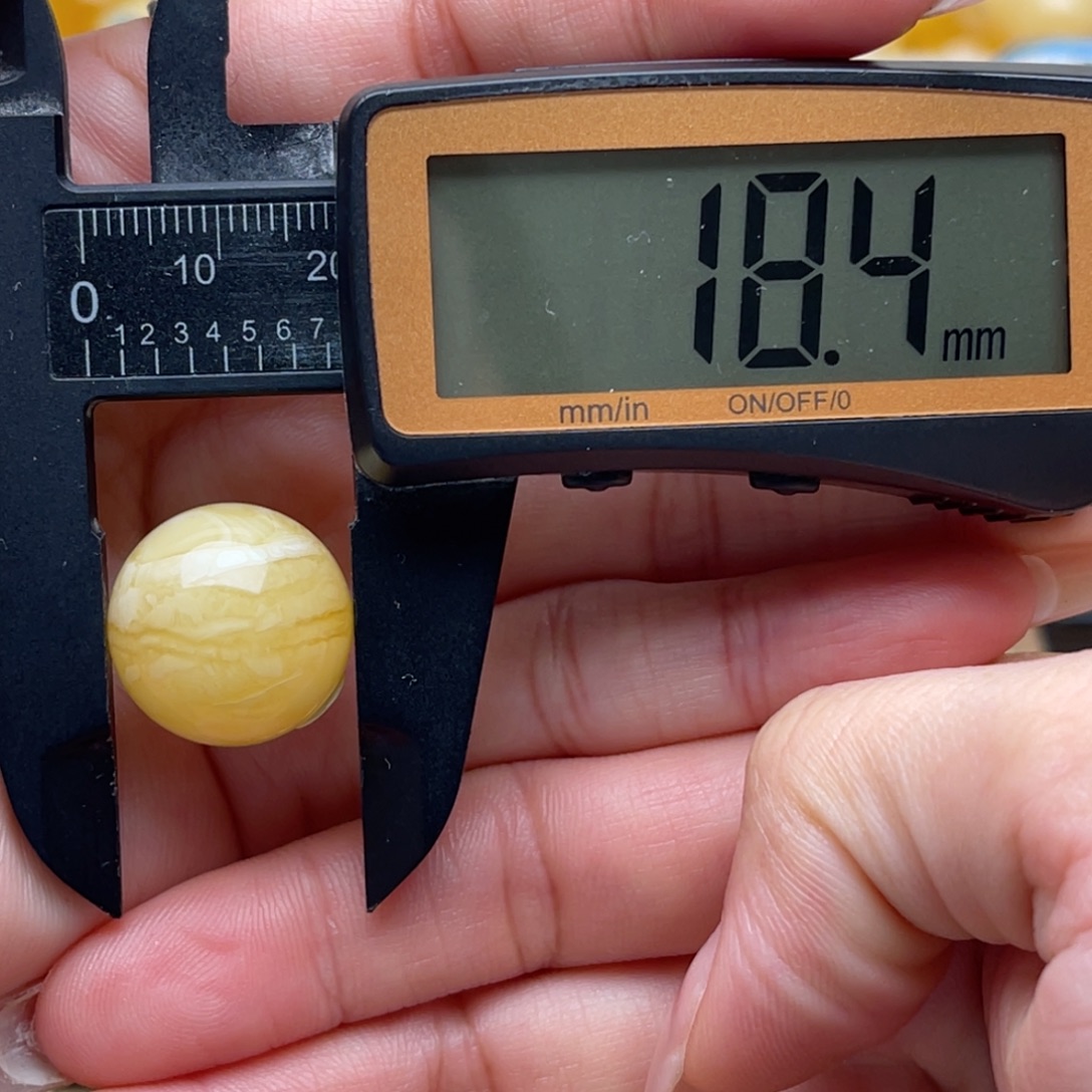 琥珀未镶嵌裸石蜜蜡圆珠笑