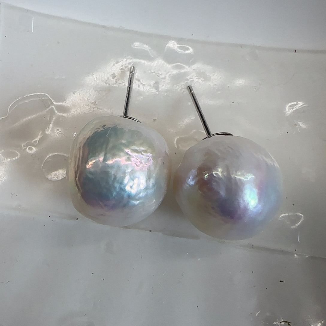 淡水珍珠耳饰银S925镶嵌吃***?