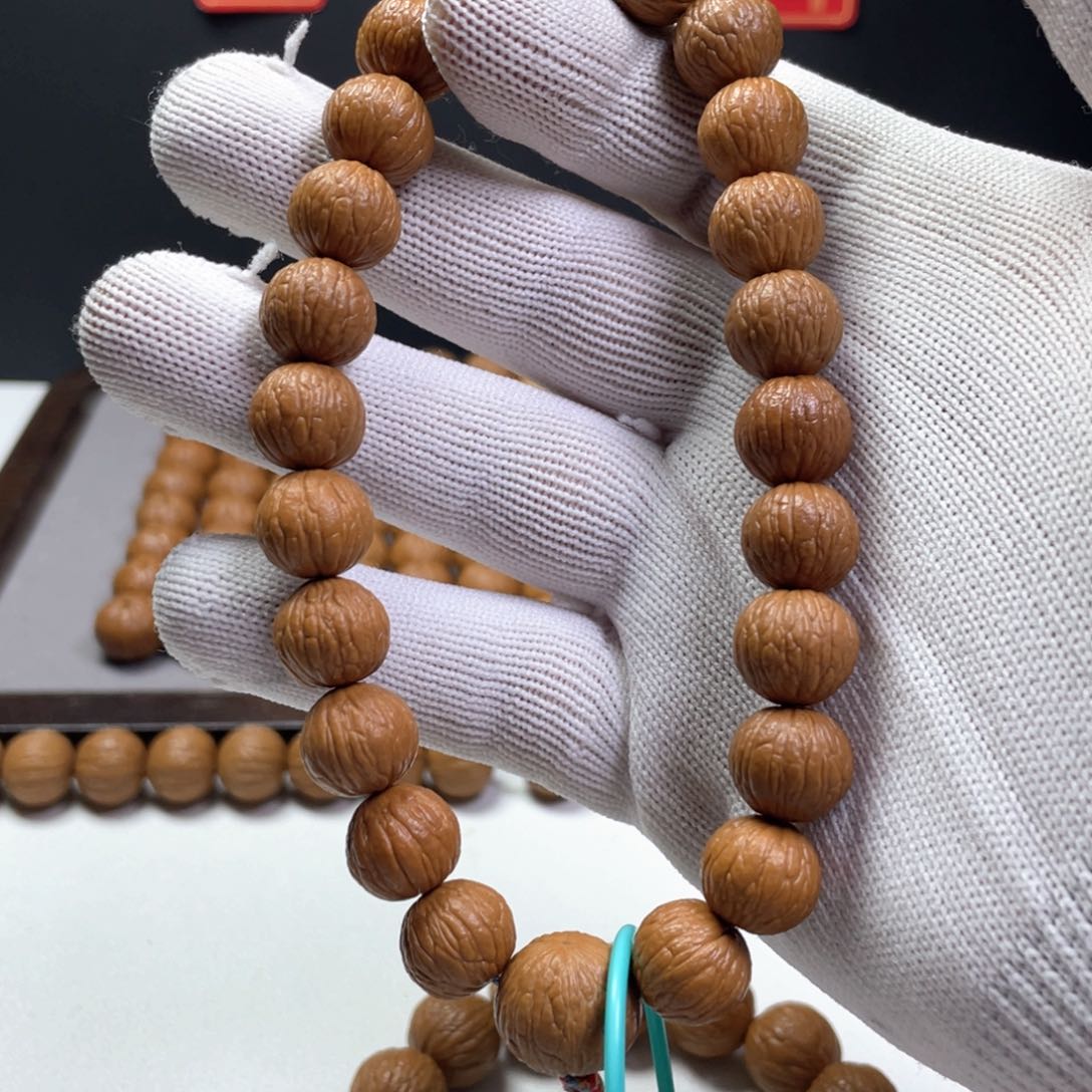 猴头核桃手串?凤羽