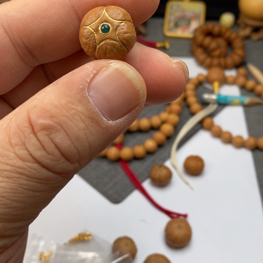 凤眼菩提吊坠刘****计5星佛头三通