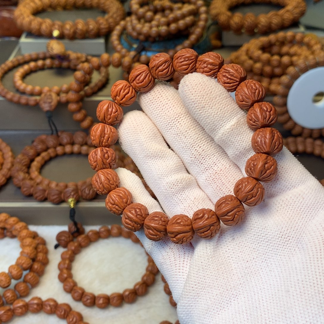 陌****桃核手串秦岭龙纹