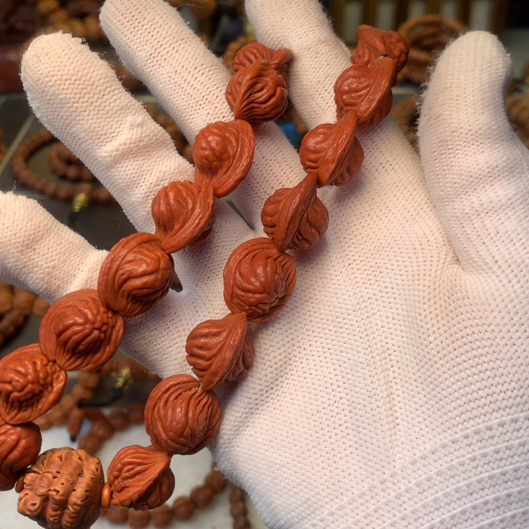 宝***划手串桃核秦岭龙纹