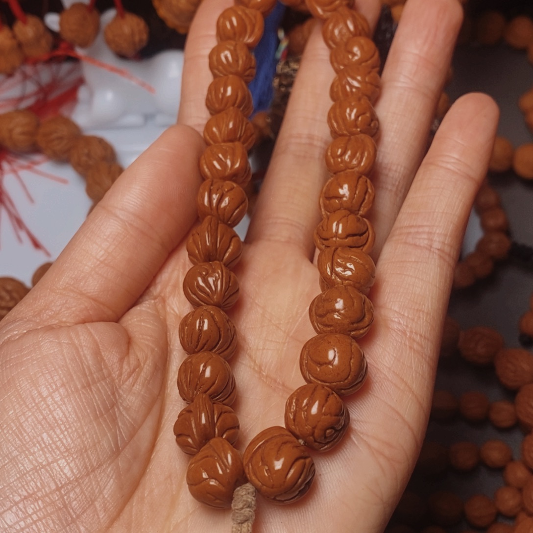 沧***海桃核吊坠桃枭手持1