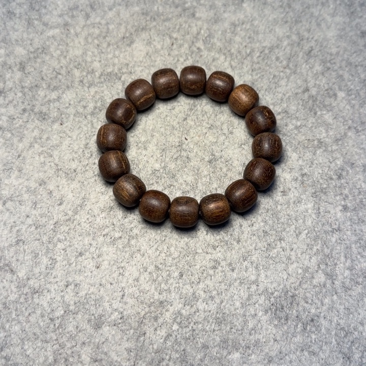 仁***者贡木13/14巴布亚贡木老料手串 